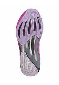 Semelle de chaussure en violet et rose avec un design texturé. Présente des rainures et des sections transparentes pour flexibilité et adhérence.