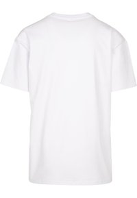 Hvid bomulds t-shirt, kortærmet, rund halsudskæring, almindelig pasform, glat tekstur. Ingen grafik eller designelementer synlige på bagsiden.
