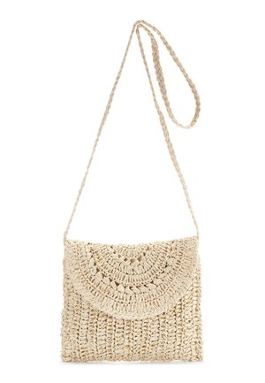 Woven straw crossbody bag in beige, featuring a textured, circular flap and braided strap for secure carrying.