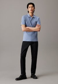 Calvin Klein BUTTON - Poloshirt - troposhere