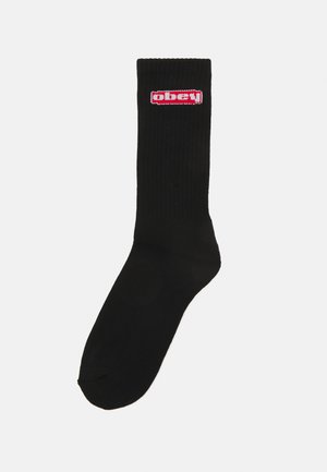 OVAL UNISEX - Socks - black