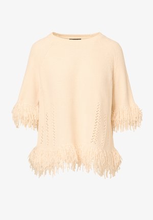 Crème-kleurige gebreide trui met franjes aan de onderkant en mouwen, met decoratieve open steekdetails. Zachte textuur en ontspannen pasvorm.
