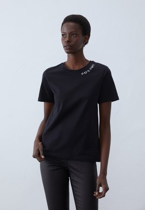 Apdrukāts T-krekls - black