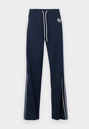 Pantaloni sportivi blu navy con coulisse bianca, strisce laterali bianche, tasche laterali e un piccolo logo circolare bianco sulla parte anteriore destra.