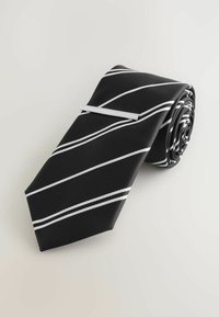 Black striped tie featuring diagonal white stripes, made from textured fabric, rolled and secured with a silver tie clip.