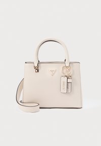 Beežika värvi struktuurne käsitööna valminud käekott kuldsete metalldetailidega, tekstuurse pinnaga, kahe peamise käepidemega ja eemaldatava õlarihmaga. Sisaldab brändi logo ja silte.