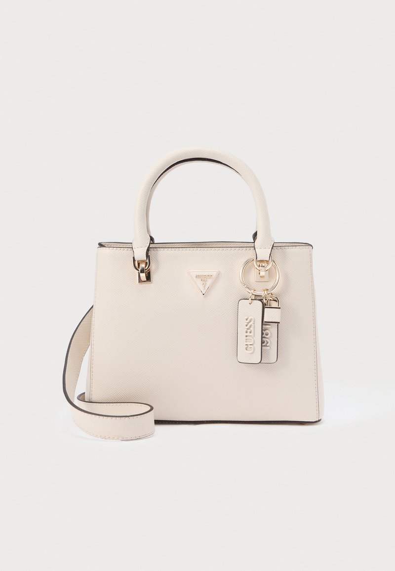 Beežika värvi struktuurne käsitööna valminud käekott kuldsete metalldetailidega, tekstuurse pinnaga, kahe peamise käepidemega ja eemaldatava õlarihmaga. Sisaldab brändi logo ja silte.