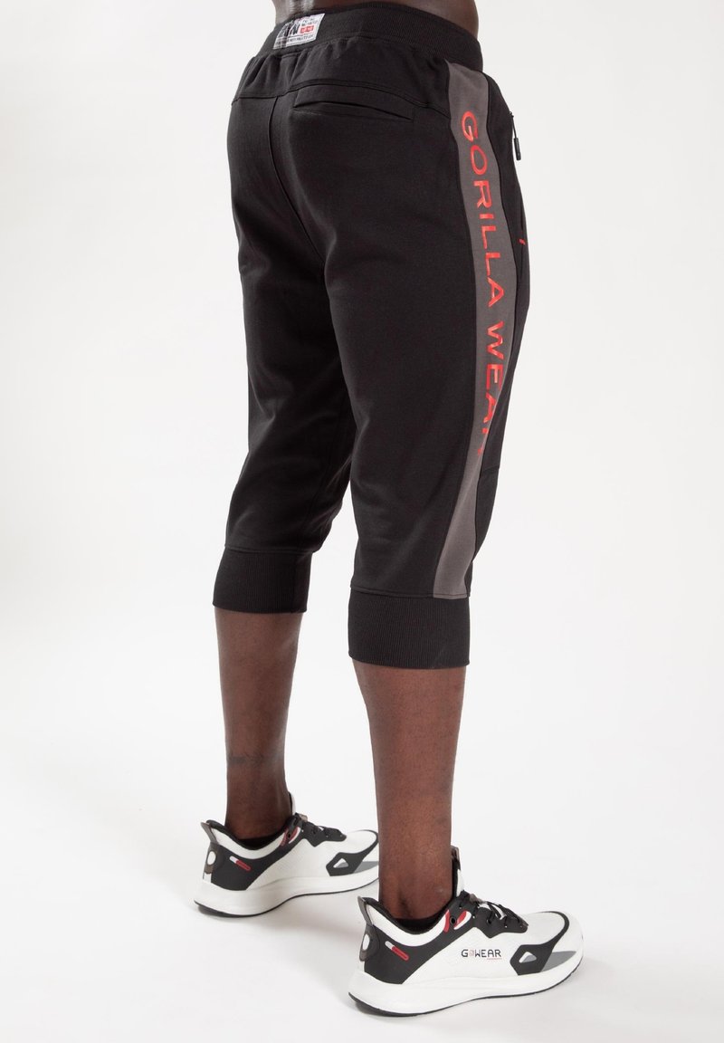 Joggingbroeken voor heren LACOSTE Men's Tracksuit Trousers Black