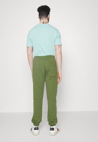 Scotch & Soda PANT UNISEX - Calças de fato de treino - lizzard