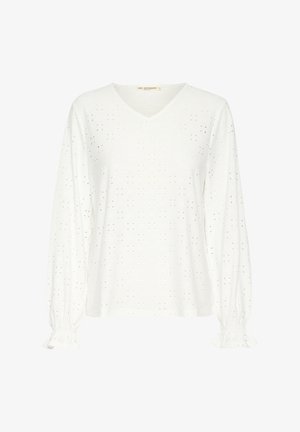 White long-sleeve top with a V-neck and puffed sleeves, featuring a textured pattern of eyelet cutouts and elasticized cuffs.