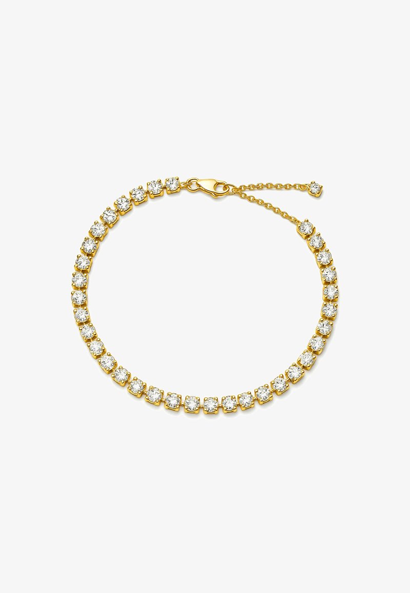 Gold bracelet featuring a continuous line of round, clear cubic zirconia stones set in square prongs, with a secure lobster clasp.
