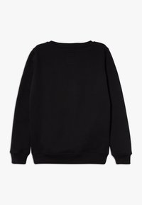 Felpa nera con scollatura rotonda, maniche lunghe, polsini e orlo a costine, realizzata in un tessuto morbido. Presenta una piccola etichetta sul retro.