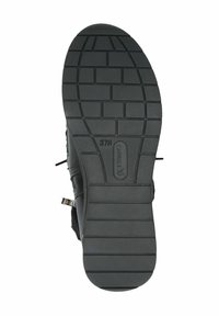 Suela de zapato de goma negra con un patrón de relieve texturizado, que presenta un logo elevado y el tamaño "37H" en la parte inferior para mayor agarre y soporte.