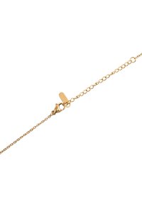 Gold chain bracelet with an oval link design, featuring a lobster clasp and a small tag detailing the brand name.