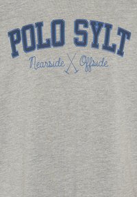 Gray cotton t-shirt featuring blue embroidered text "POLO SYLT" with the words "Nearside" and "Offside" below in a lighter blue, plus crossed poles detail.