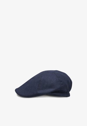 Dark blue flat cap made of textured fabric with a short, curved brim, shown on a white background.