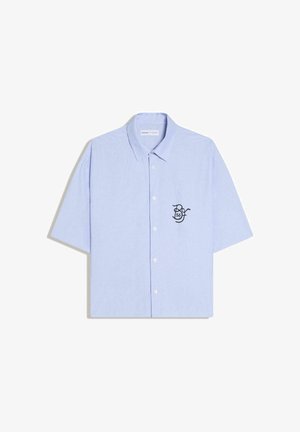 Light blue short-sleeve button-up shirt with a collar and small black embroidered logo on the left chest reading "56".