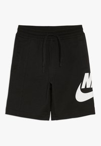 Black athletic shorts made of cotton blend fabric. Features an elastic waistband with drawstring, side pockets, and a large white Nike logo.