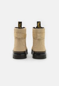 Dr. Martens Stivaletti con plateau - beige
