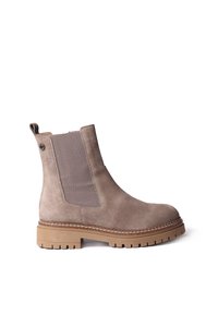 Kergelt pruun nubuk nahast pahklu_boot, millel on elastsed külgpaneelid ja tõmbenöör. Omab paksu talla, millel on sakiline äär ja dekoratiivne õmblus.