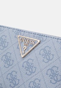 Guess LAUREL - Piniginė - light blue