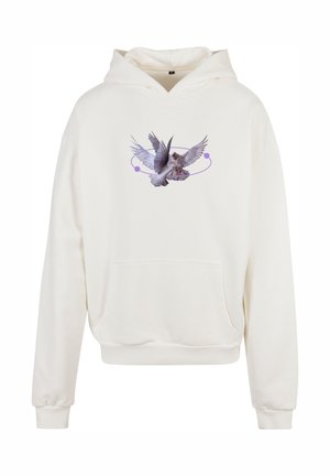 Krema dukserica s prednjim džepom; sadrži grafiku ptice koja leti unutar ljubičastog kružnog dizajna. Mekana tkanina; opušteni kroj.