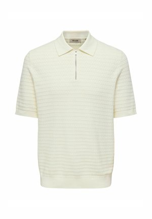 Lühikeste varrukatega polo-särk struktureeritud kreemjas kangas, millel on tõmblukuga krae ja soonikkoes mansetid. Sile viimistlus peente horisontaalsete mustritega.