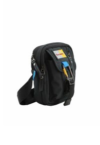 Borsa a tracolla nera in tessuto con chiusura a zip, tracolla regolabile, tasca frontale, dettagli blu e patch con logo. Design compatto e funzionale.