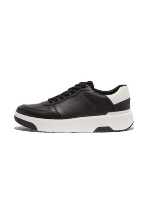 Black leather sneaker with a smooth surface, featuring a white heel accent, white midsole, and dark rubber outsole. Laced design with ventilation spots.