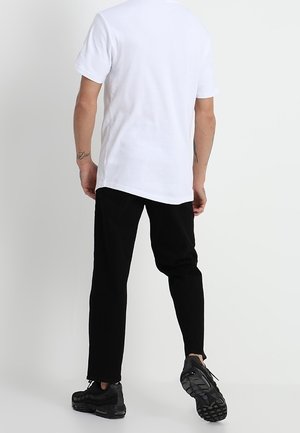 T-shirt con stampa - white