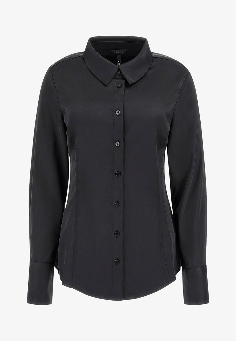 Chemise noire à manches longues avec boutons, col pointu, taille cintrée et poignets boutonnés, présentée sur une surface plane.
