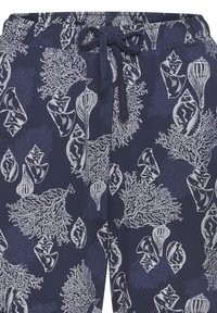 Marineblaue Hose mit elastischem Bund, verziert mit weißen Korallen- und Muschelmustern, und einem Kordelzug-Detail für eine verstellbare Passform.