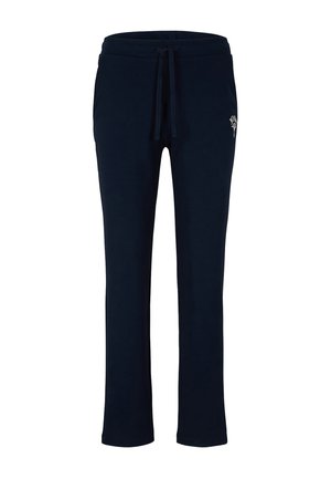 Un pantalon de survêtement bleu marine en tissu doux présente une coupe décontractée, une ceinture élastique avec un cordon de serrage et un petit logo sur la cuisse gauche.