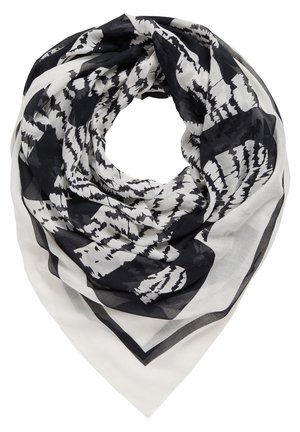 Écharpe légère à motifs noir et blanc, pliée en forme circulaire avec des motifs abstraits en zigzag et floraux.