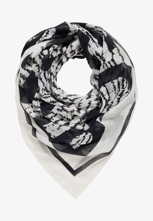 Bufanda ligera en blanco y negro con estampado, doblada en forma circular con diseños abstractos de zigzag y florales.