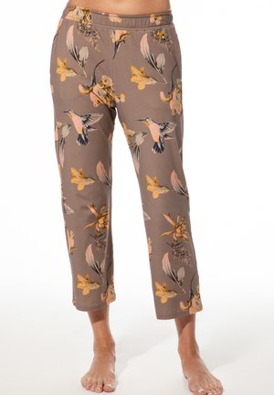 Bedruckte Hose mit braunem Untergrund, verziert mit Blumen- und Kolibri-Mustern. Weiches Material, elastischer Bund und gekürzte Länge.