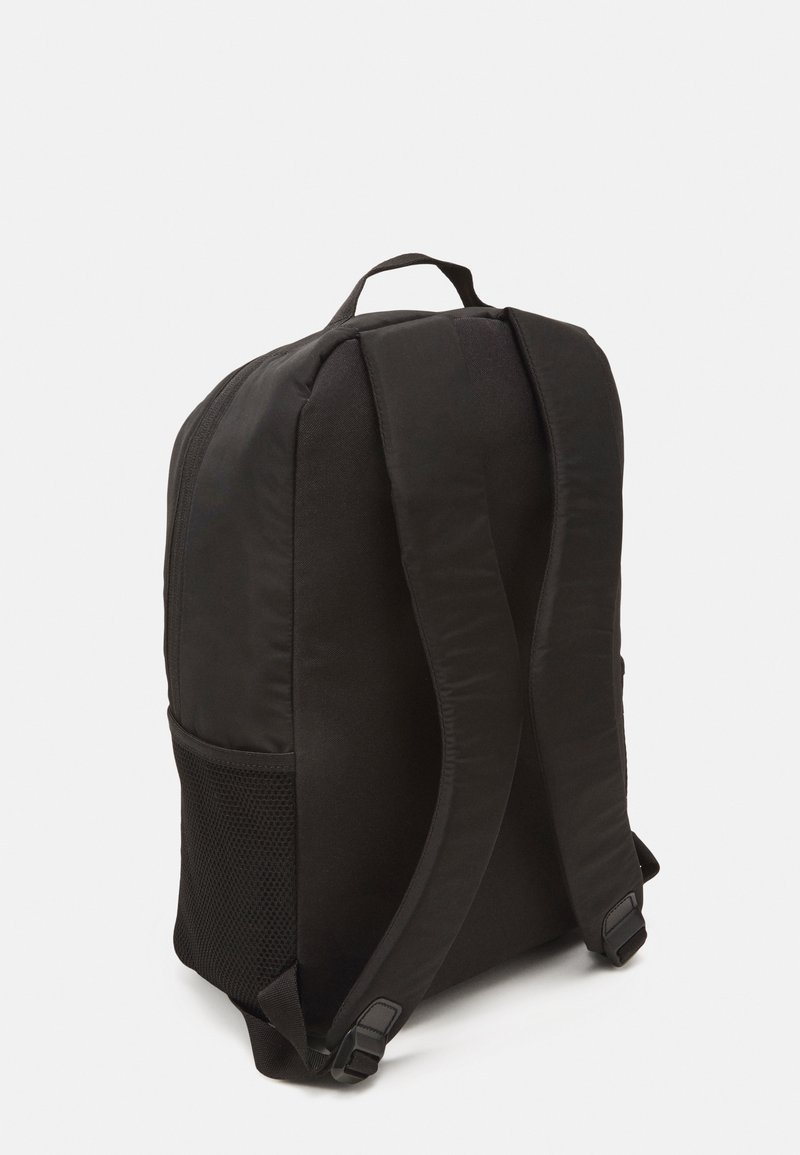 adidas green and black backpack