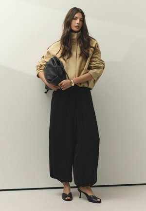 Next, Pantolette hoch - black