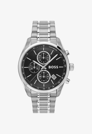 Montre en acier inoxydable avec un cadran noir, lunette tachymétrique argentée, trois sous-cadrans et affichage de la date ; bracelet à maillons avec des accents polis.