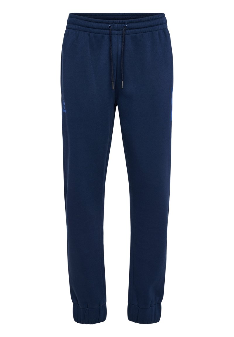 Marinblå joggerbyxor tillverkade av mjukt tyg, med elastisk midja och snörningar samt ribbade cuffs vid anklarna.