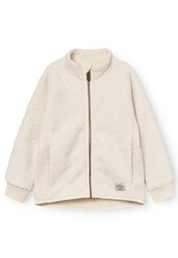 Cremfarbener Fleece-Jacke mit durchgehendem Reißverschluss, hohem Kragen, gerippten Bündchen und einem kleinen Etikett am unteren Saum. Weicher, strukturierter Stoff.