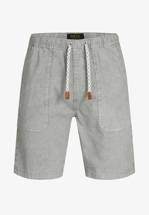 Hellgraue Freizeitsommerhose mit elastischem Bund, weißem Kordelzug mit braunen Lederspitzen und vorderen aufgesetzten Taschen.