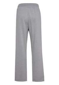 Graue Sweatpants mit entspannter Passform, elastischem Bund und weicher Textur. Keine sichtbaren Taschen oder Verzierungen.