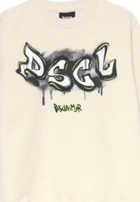 Felpa beige con testo in stile graffiti audace "PSCL" in bianco e nero, con evidenziature gialle e colature di vernice. Materiale in cotone.