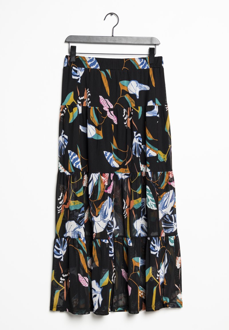 Jupe noire à motif floral avec un design à volants comprenant des motifs de feuilles colorées en vert, bleu, rose et blanc sur un tissu transparent.