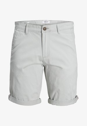 Shorts en coton gris clair avec ourlets roulés, fermeture à bouton et zip à l'avant, deux poches latérales, et étiquette de la marque visible à la taille.