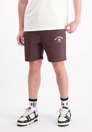 BAD HABITS - Tracksuit bottoms - brown