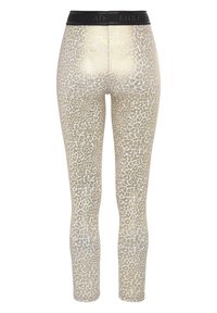 Metallisch goldene Leggings mit einem Leopardenmuster. Elastischer schwarzer Bund mit geprägtem Logo. Glatte Textur und enganliegendes Design.