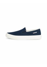 Scarpa in tela navy slip-on con suola in gomma bianca, dotata di pannelli elasticizzati sui lati e di un piccolo tag logo sul tallone esterno.