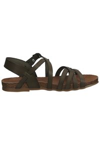 Dark green sandal with multiple strap design, adjustable ankle strap, and cork sole. Textured footbed for comfort, flexible rubber outsole.